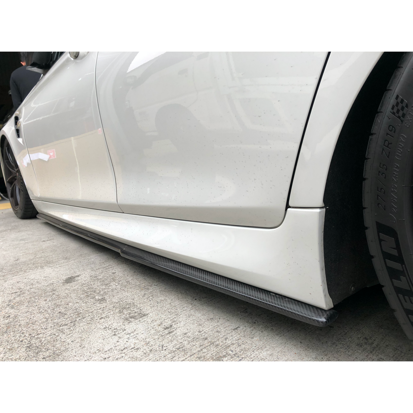 F10 CARBON FIBER SIDE SKIRT EXTENSIONS